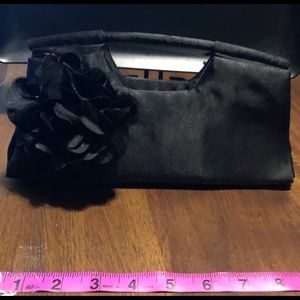 A classic beauty...black clutch w/ handle